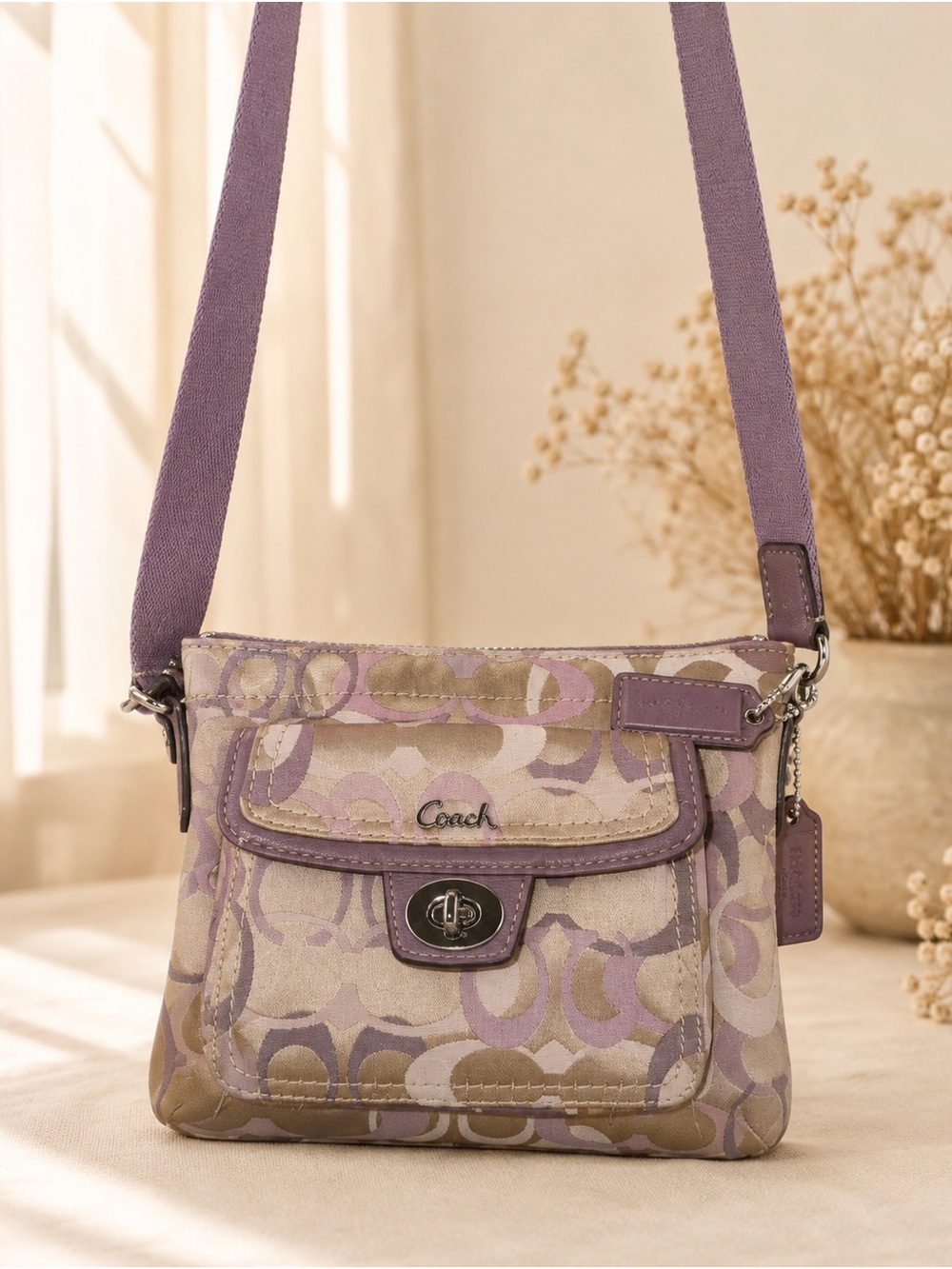 Coach Penelope Signature Turnlock Swingpack Lavender Crossbody Bag